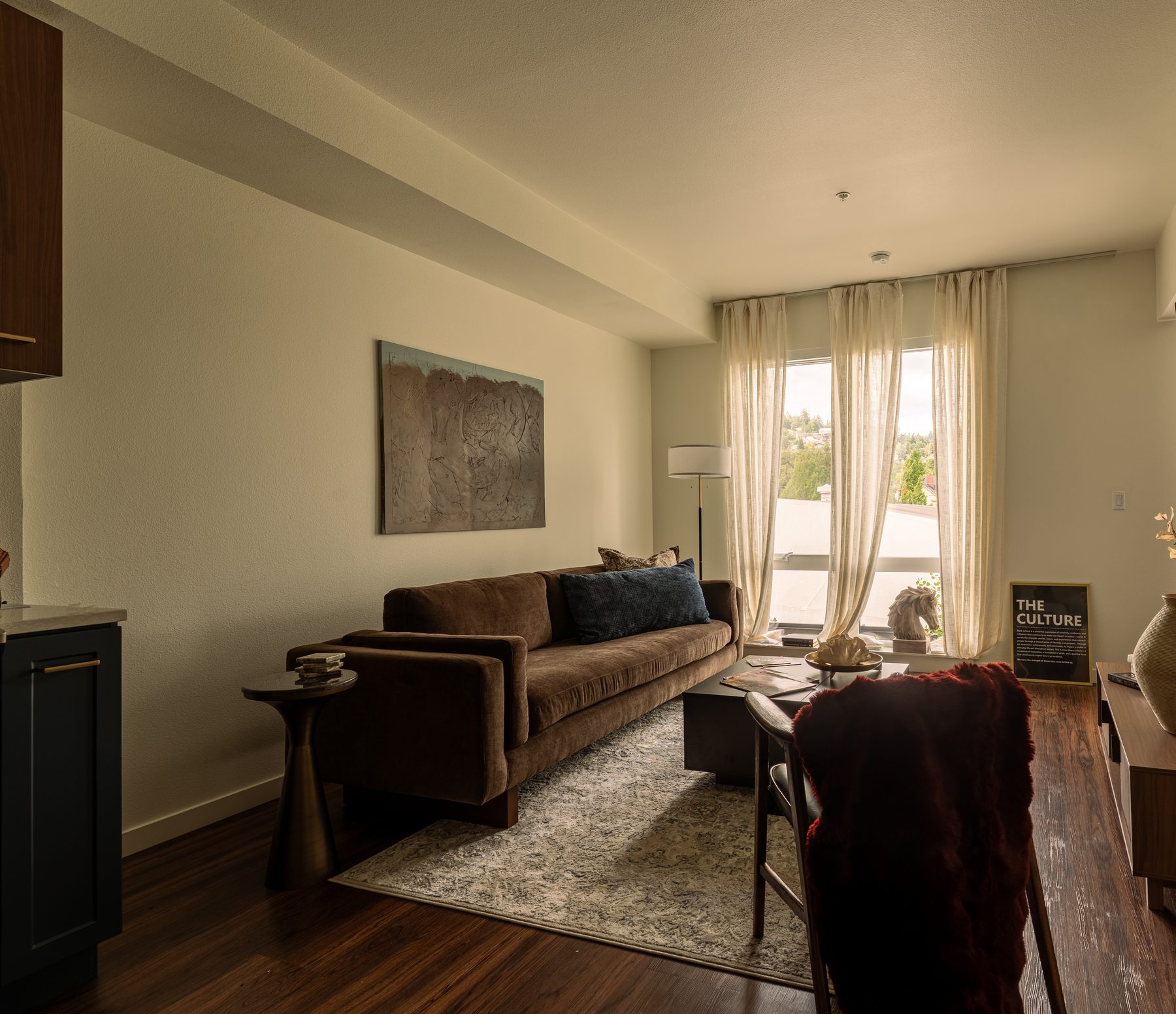 Empty room before styling, showing the window and floor